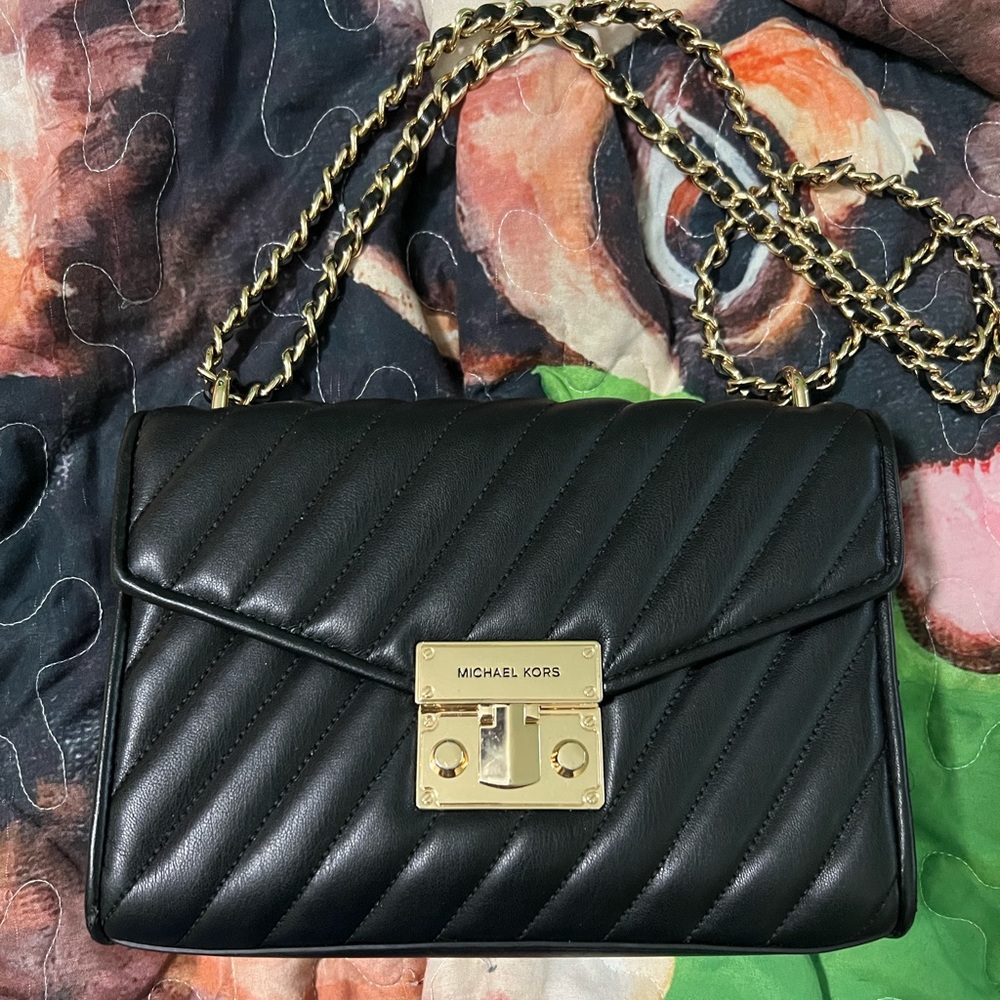 Ribbed black Michael Kors crossbody purse